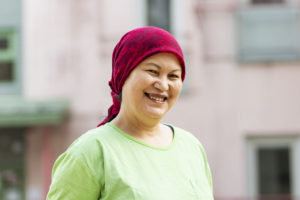 "Rahima Hussaini hymyilee kameralle."